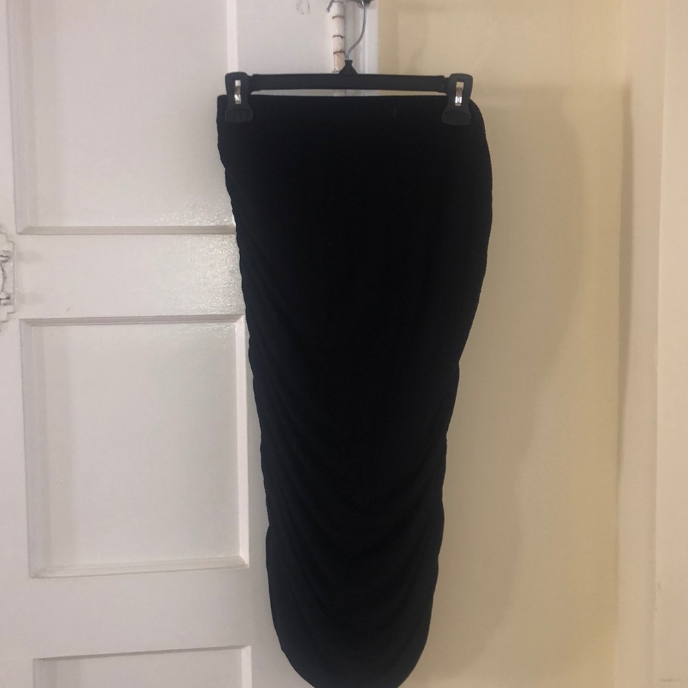 Black midi skirt with scrunched sides. Used